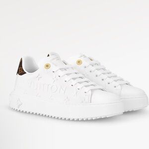 Louis Vuitton Time Out White Sneakers.       
White used but Good Condition